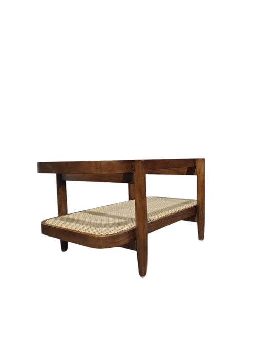 The glass top surface and lower cane woven shelf provide ample space for display and storage in your living room