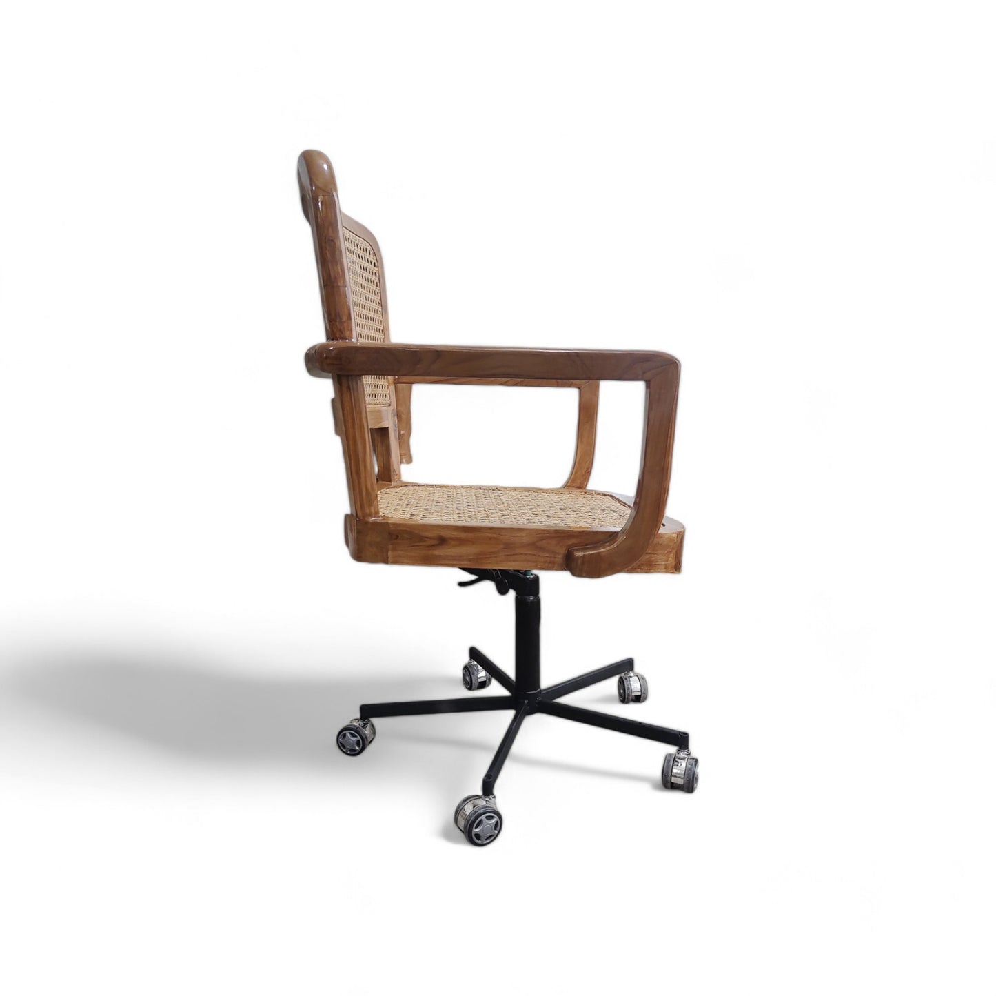 Premium Teak Wood Living Room Swivel Chair with Natural Cane Webbing, Ergonomic Armrests, and Sleek Semi-Matt Finish for Modern Interiors.