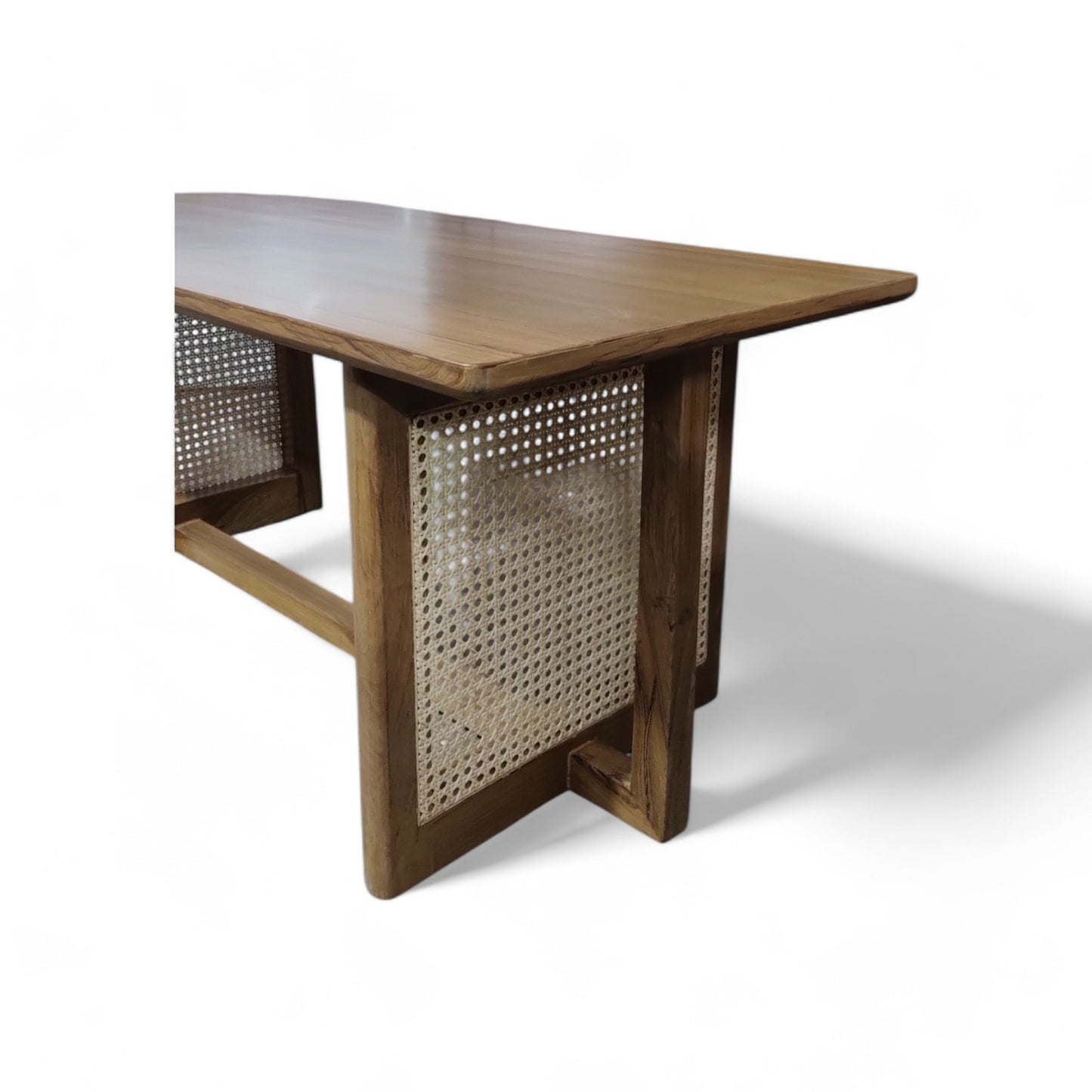 Elevate Your Living Room with Our Stunning Teak Wood Coffee Table Featuring Natural Cane Weaving. The Teak Colour Matte Finish adds a Touch of Warmth and Sophistication.