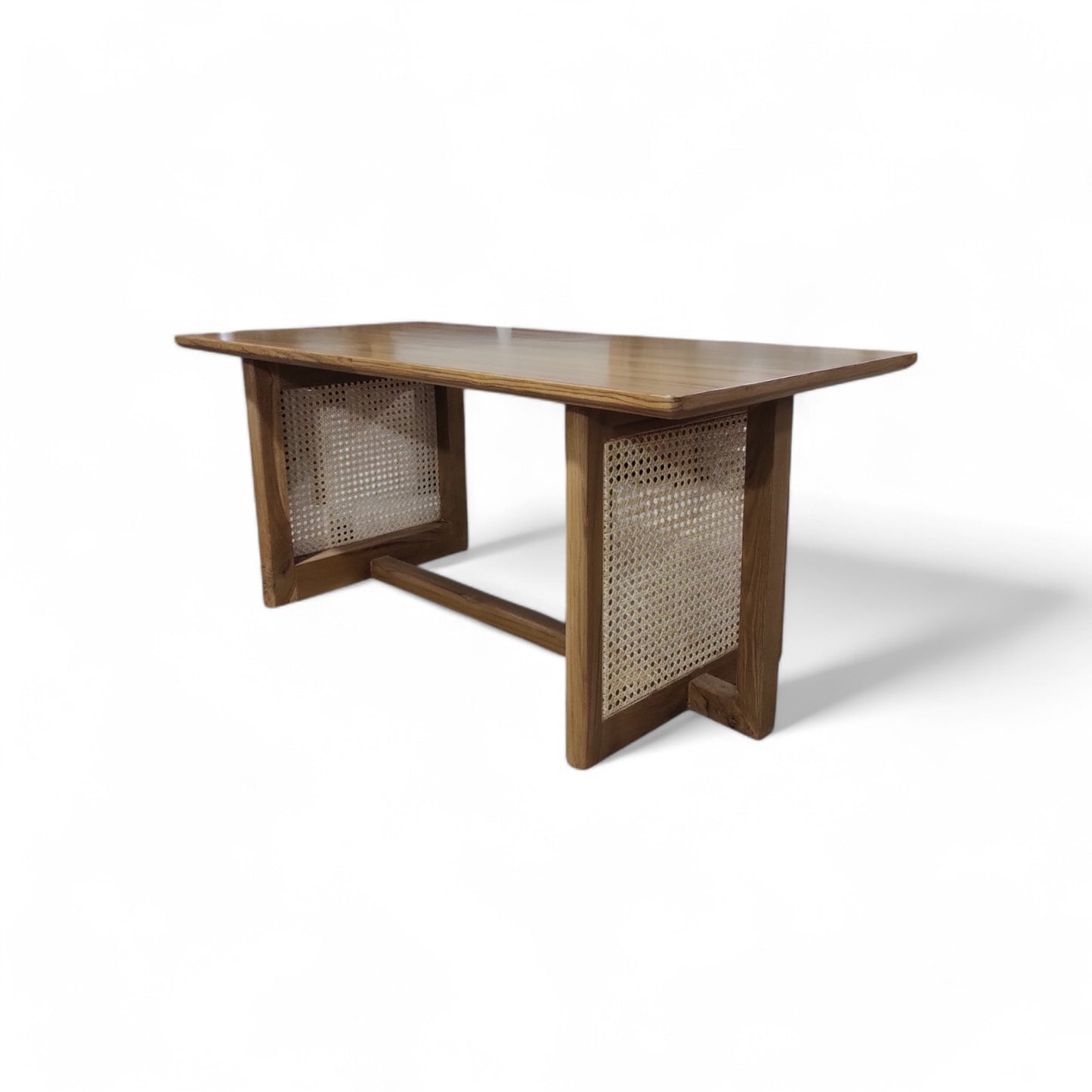 Elevate Your Living Room with Our Stunning Teak Wood Coffee Table Featuring Natural Cane Weaving. The Teak Colour Matte Finish adds a Touch of Warmth and Sophistication.