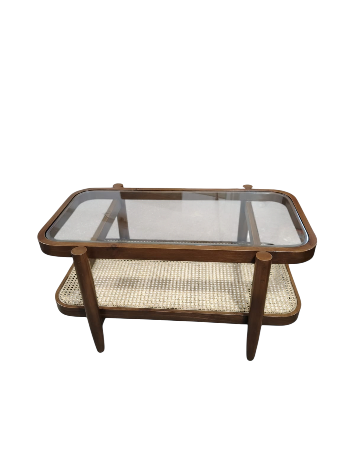 The glass top surface and lower cane woven shelf provide ample space for display and storage in your living room